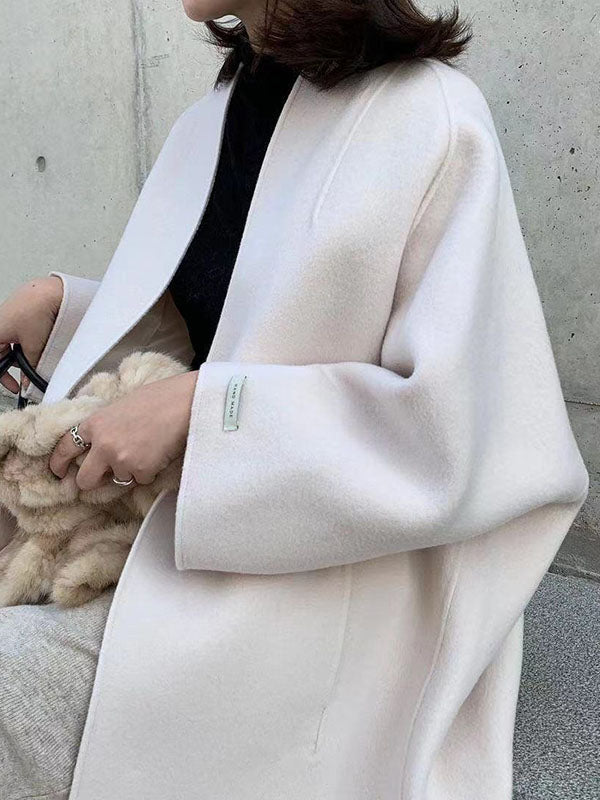Manteau en laine ample à manches longues, sans col, couleur unie
