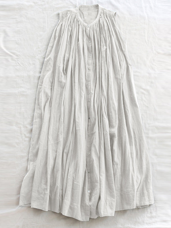 Robe mi-longue ample plissée transparente sans manches, à col rond