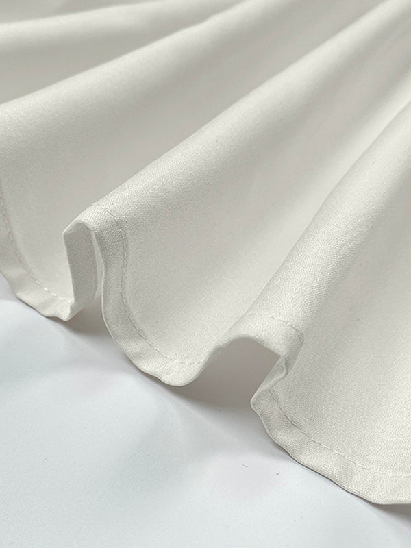 Chemisier asymétrique à manches bouffantes, à imprimé floral, à empiècements, à col revers