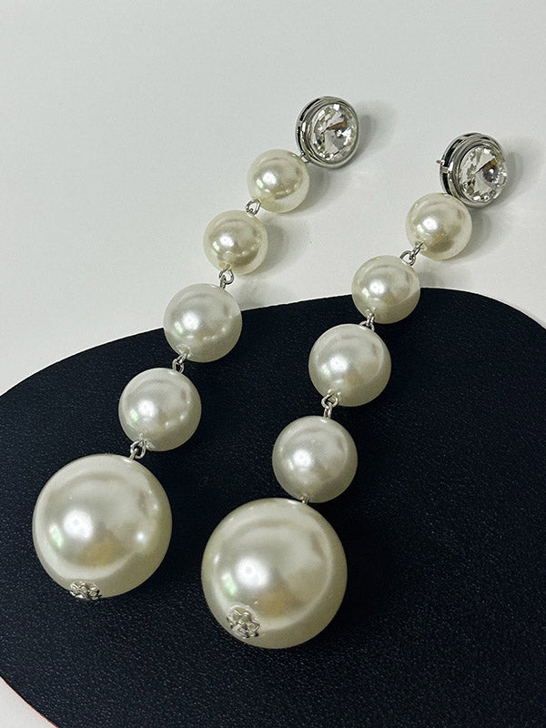 Boucles d'oreilles perlées géométriques brillantes