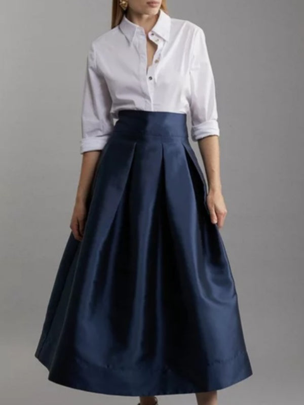 Jupe plissée coupe trapèze, taille haute, à fermeture éclair, couleur unie
