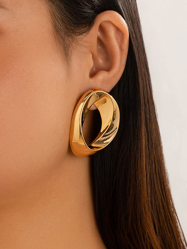 Boucles d'oreilles asymétriques brillantes couleur unie