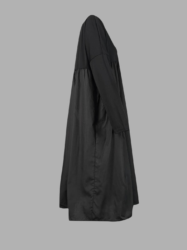 Robe mi-longue simple ample noire à empiècements, à manches longues