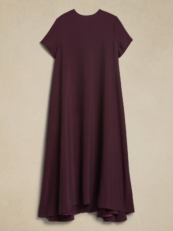 Robe longue ample à manches courtes, à poches, à col rond, couleur unie