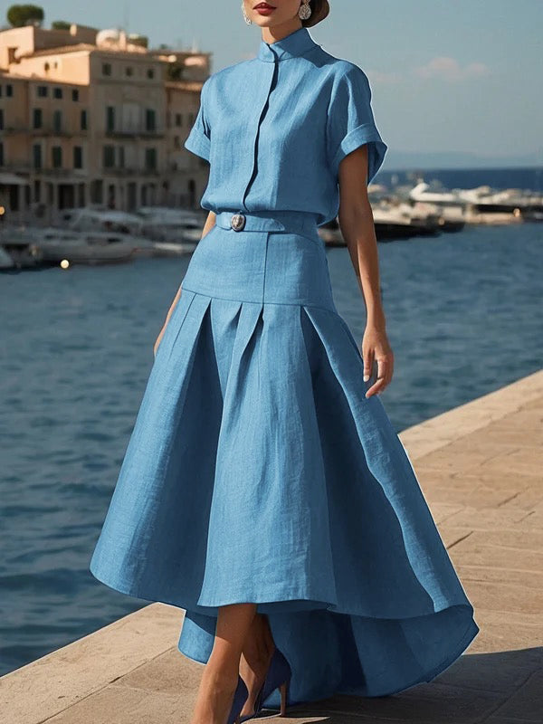 Jupe plissée taille haute, à ourlet plongeant, avec ceinture, couleur unie