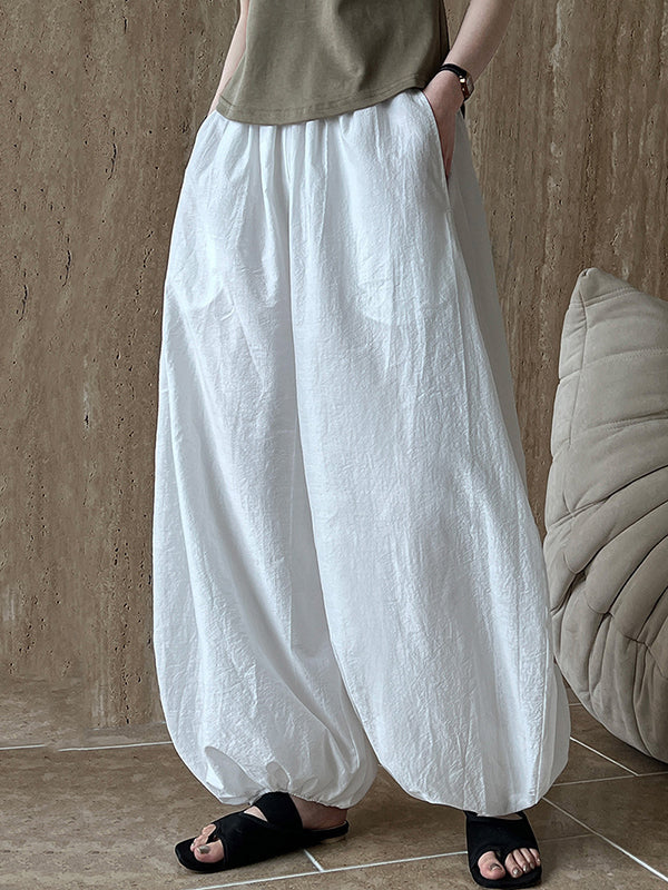 Pantalon taille haute, à taille élastique, à empiècements, couleur unie