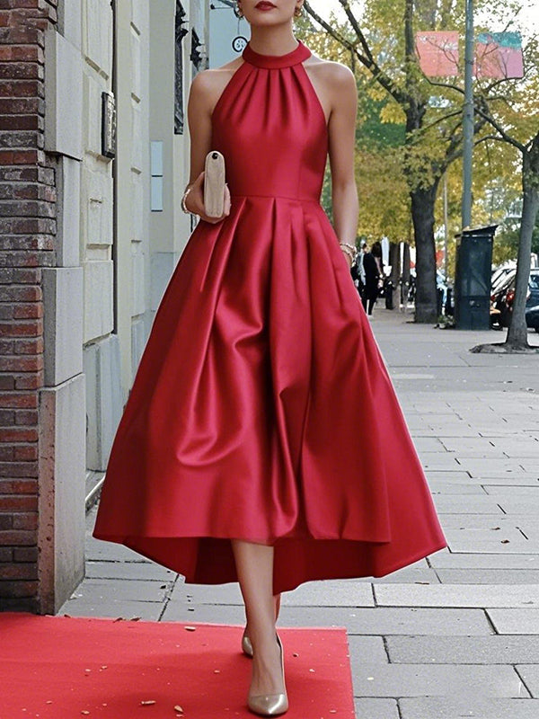 Robe longue plissée coupe trapèze, à ourlet plongeant, taille haute, à poches, à col licou, couleur unie