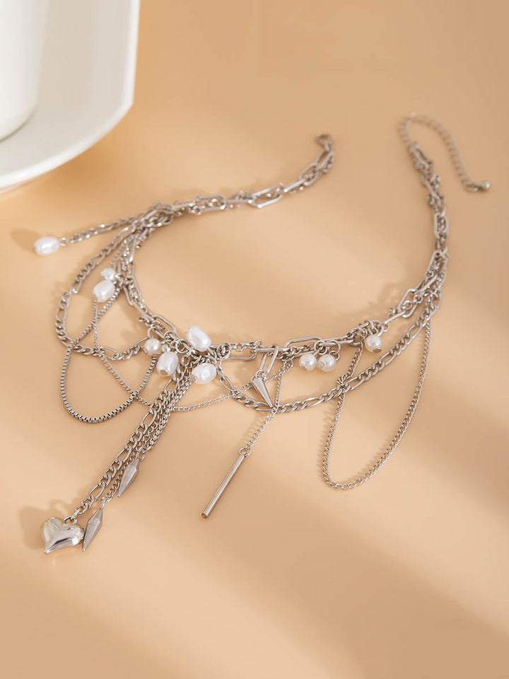 Collier géométrique à chaîne, à pompons