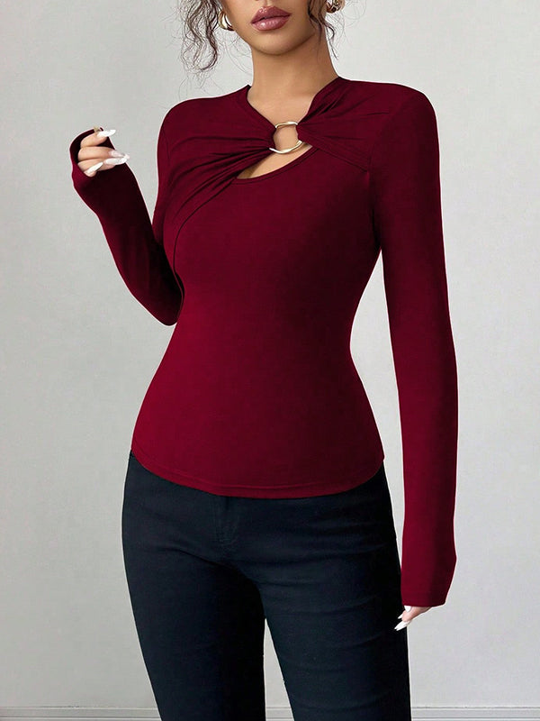 T-shirt à manches longues, coupe près du corps, à empiècements, à col asymétrique, couleur unie