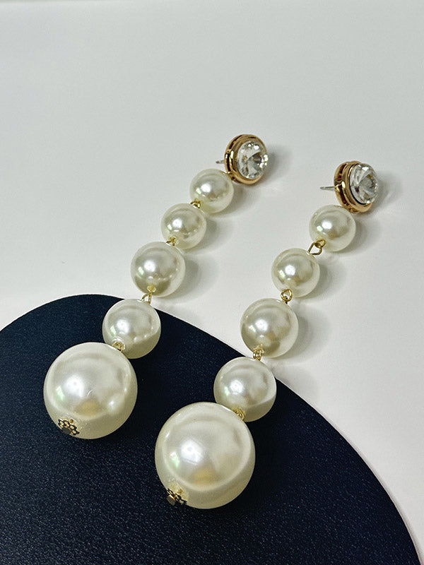 Boucles d'oreilles perlées géométriques brillantes