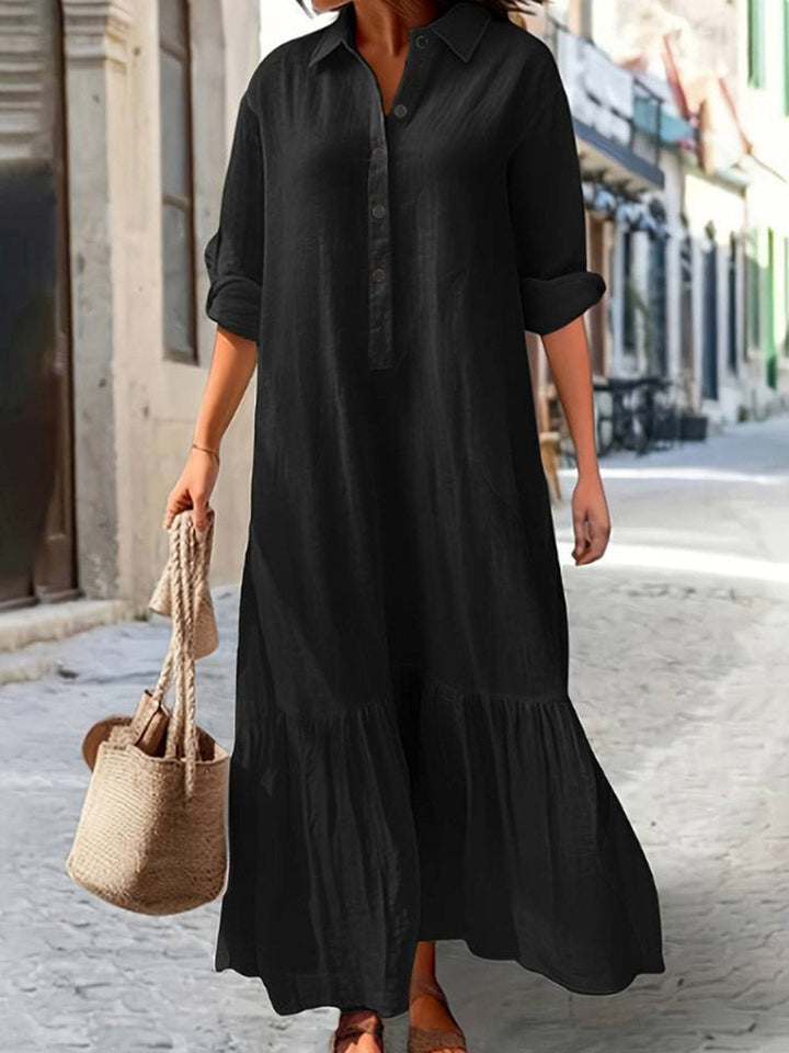 Robe longue boutonnée plissée coupe trapèze, à manches longues, à empiècements, à col revers, couleur unie