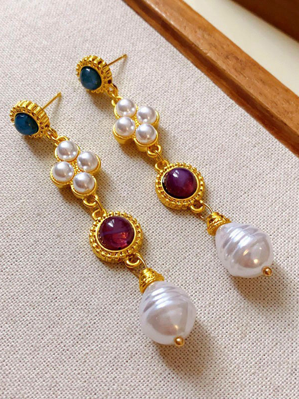 Boucles d'oreilles pendantes géométriques à pompons