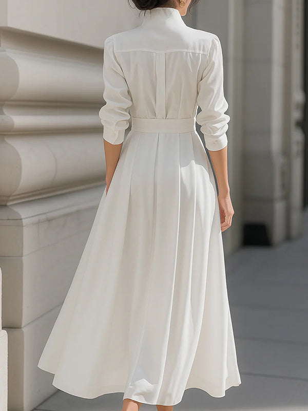 Robe longue ample à manches longues, avec ceinture, à poches, à col montant, couleur unie