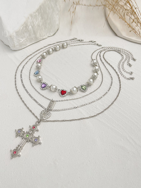 Collier superposé à pompons