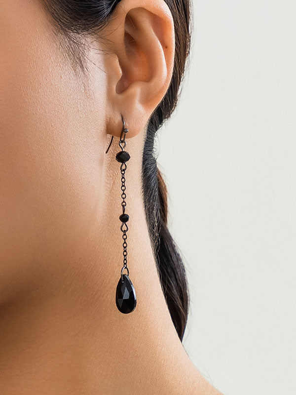 Boucles d'oreilles pendantes géométriques à pompons
