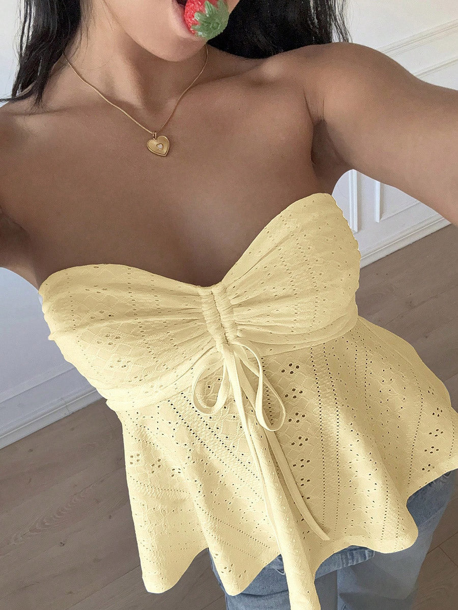Débardeur ajouré plissé noué coupe près du corps, sans manches, dos nu, à empiècements, bustier, couleur unie