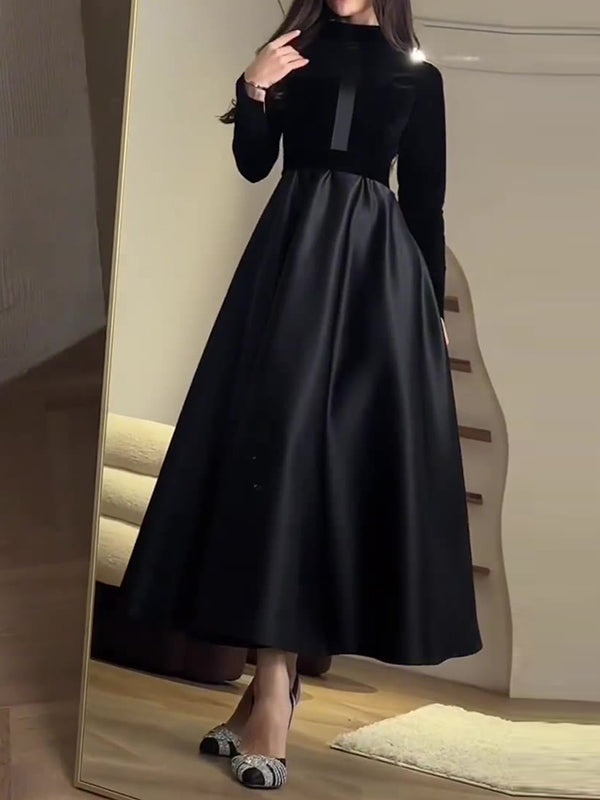 Robe longue plissée coupe trapèze, à manches longues, à empiècements, à fermeture éclair, à col cheminée