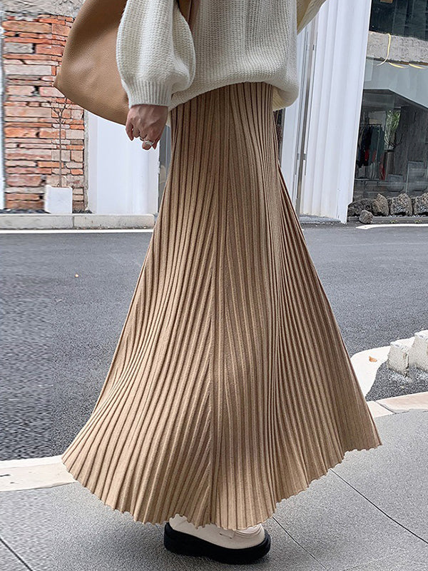 Jupe plissée coupe trapèze, taille haute, couleur unie
