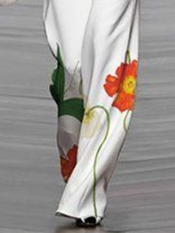 Pantalon ample asymétrique taille haute, à imprimé floral, à empiècements