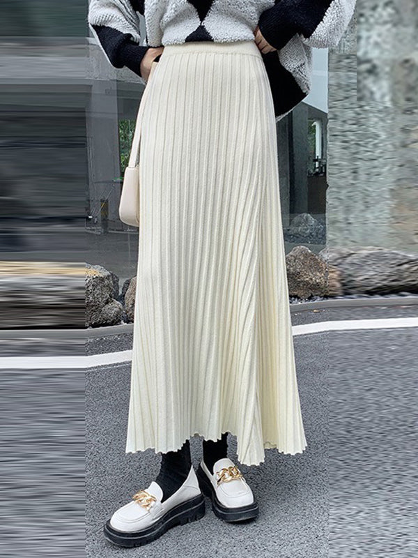 Jupe plissée coupe trapèze, taille haute, couleur unie