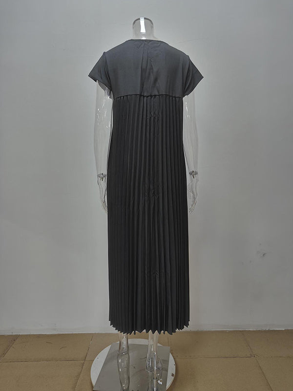 Robe longue plissée coupe trapèze, taille haute, à poches, à empiècements, à col rond, couleur unie