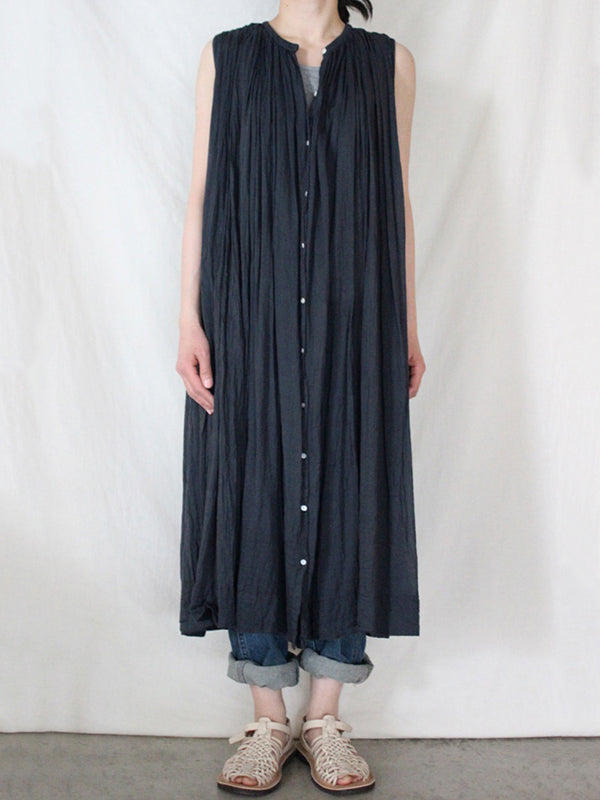 Robe mi-longue ample plissée transparente sans manches, à col rond