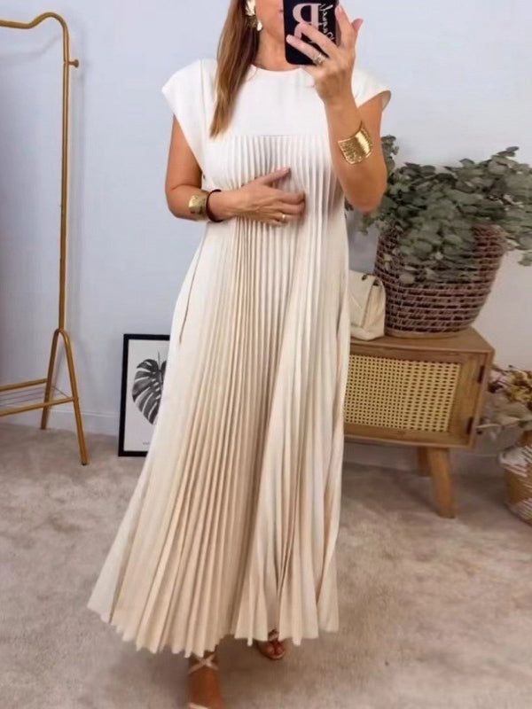 Robe longue plissée coupe trapèze, taille haute, à poches, à empiècements, à col rond, couleur unie