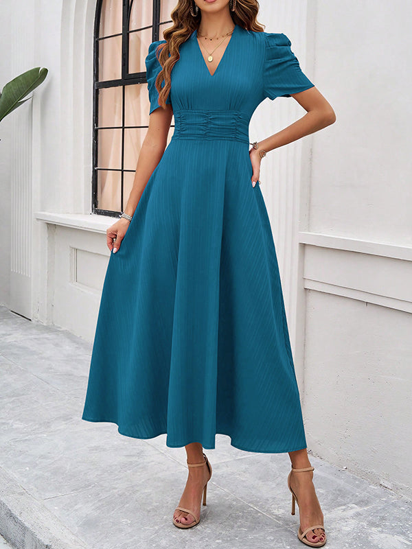 Robe longue plissée coupe trapèze, taille haute, à fermeture éclair, à col en V, couleur unie