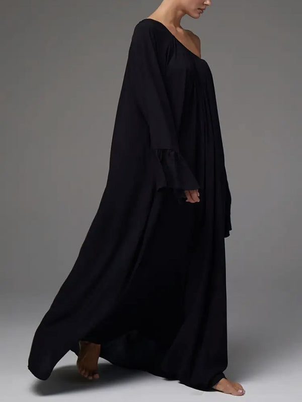 Robe longue ample plissée à manches évasées, à empiècements, à col rond, couleur unie
