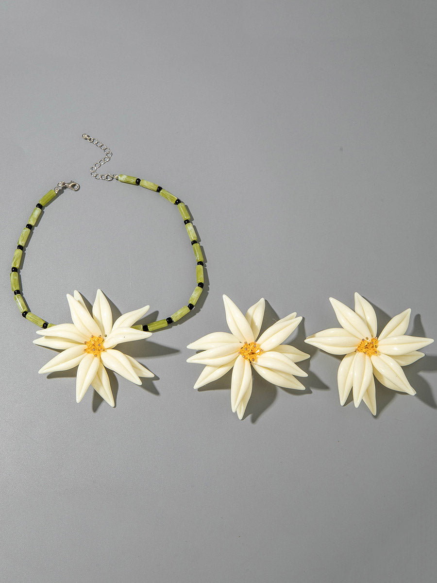 Parure collier et boucles d'oreilles pendantes en forme de fleur