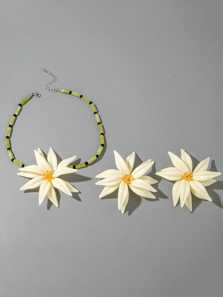 Parure collier et boucles d'oreilles pendantes en forme de fleur