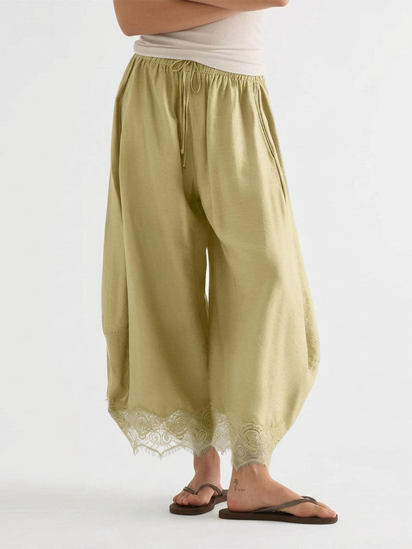 Pantalon ample à empiècements, à poches, à taille élastique, à cordon de serrage, à jambes larges, couleur unie