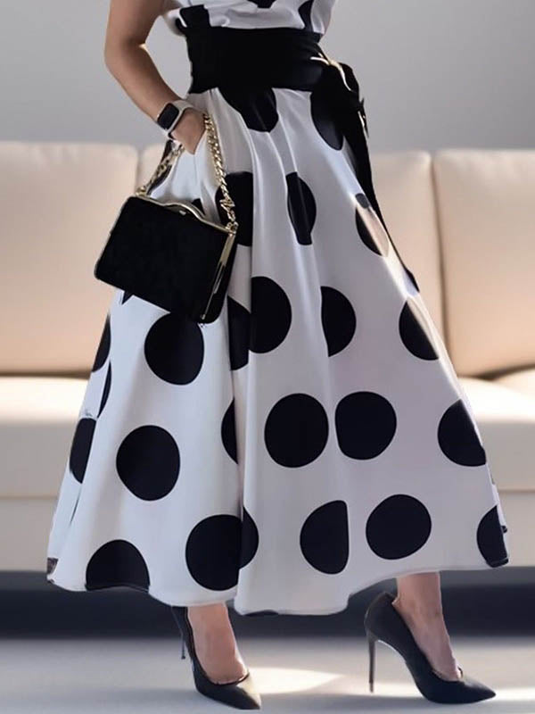 Robe chemise coupe trapèze, sans manches, à pois, à empiècements, à taille nouée, à col revers