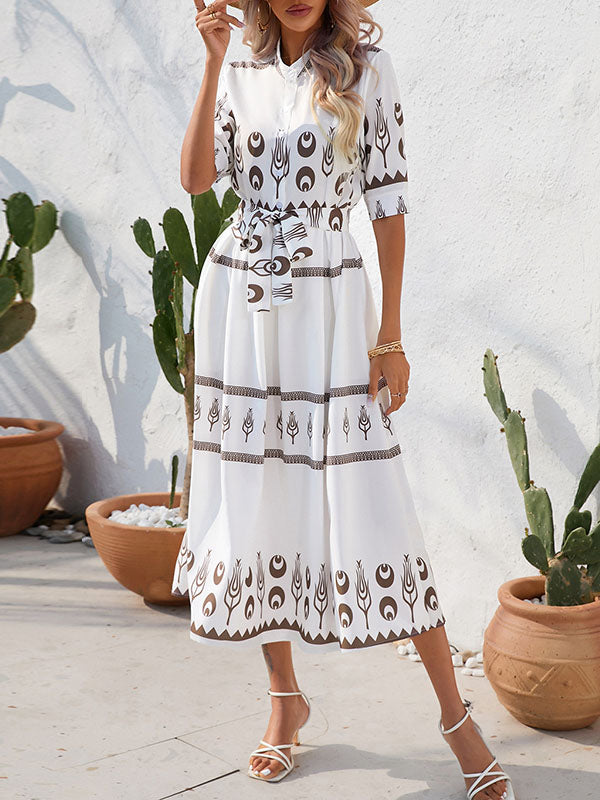 Robe mi-longue boutonnée coupe trapèze, à manches mi-longues, à taille nouée, à col revers