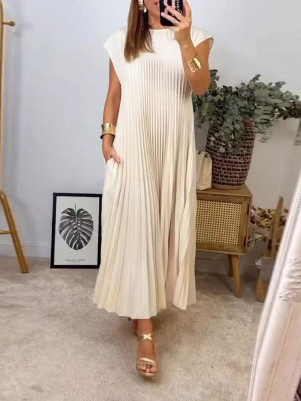Robe longue plissée coupe trapèze, taille haute, à poches, à empiècements, à col rond, couleur unie