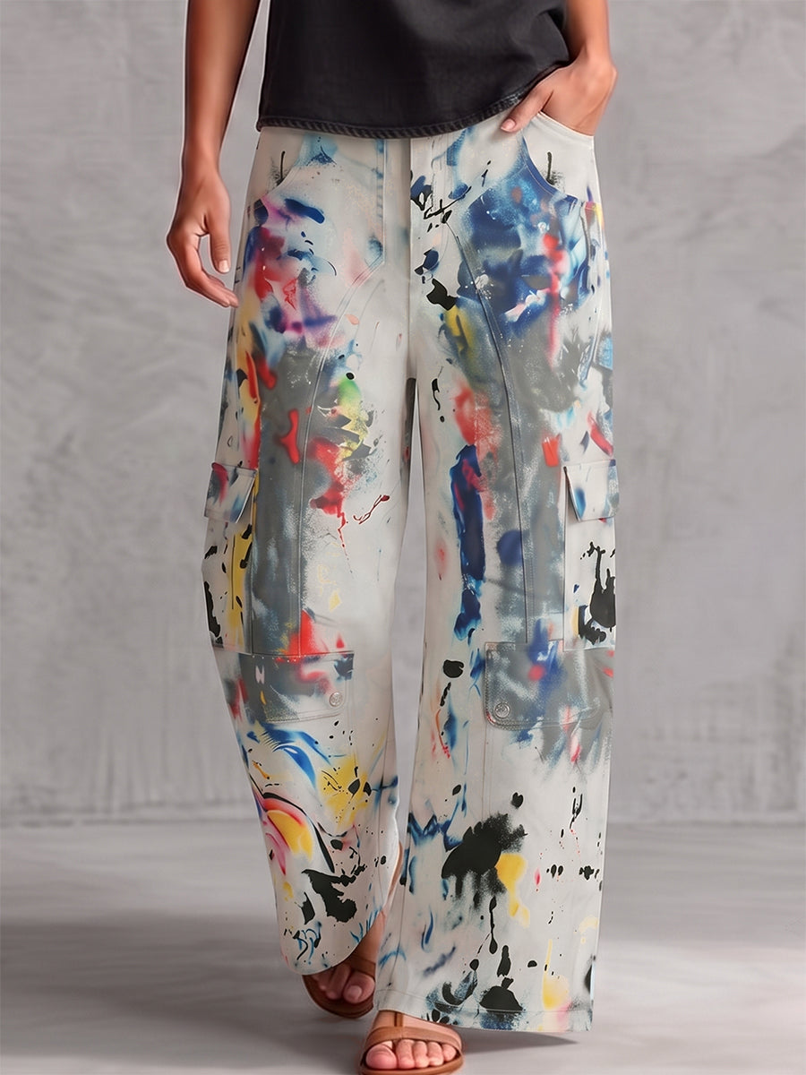 Bas de pantalon en Jean taille haute, jambe large, boutonné, couleur contrastée, poches imprimées graffitis