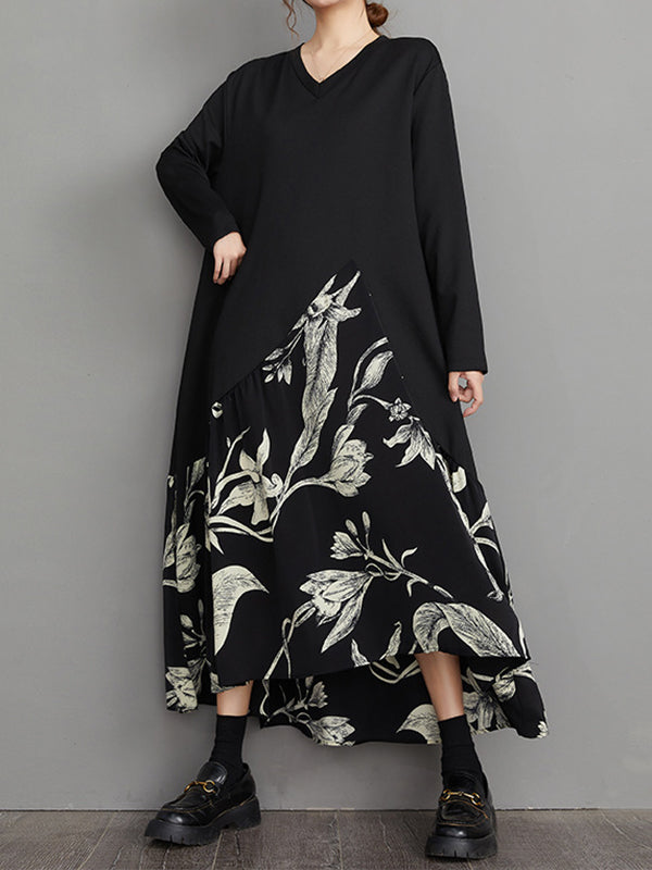 Robe mi-longue asymétrique coupe trapèze, à ourlet plongeant, à imprimé floral, à empiècements, à col en V