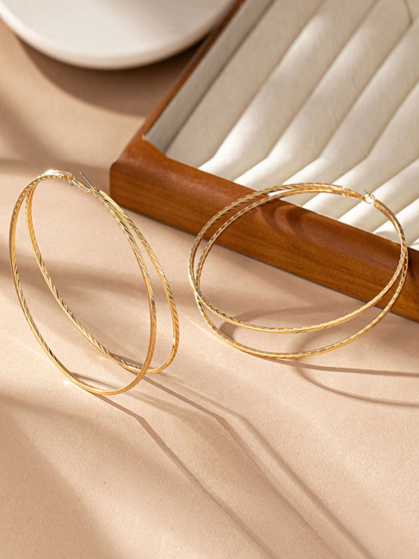 Boucles d'oreilles géométriques superposées
