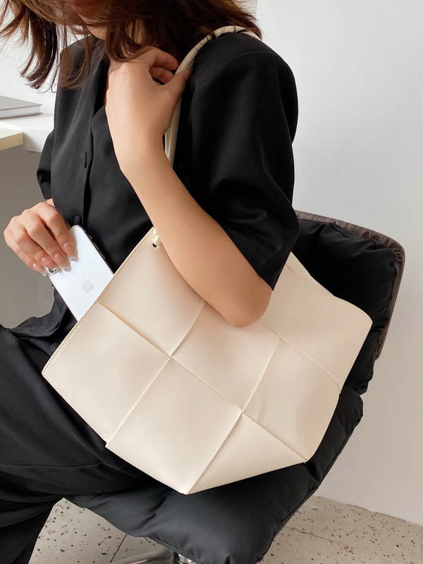 Sac à main géométrique tressé à empiècements, couleur unie