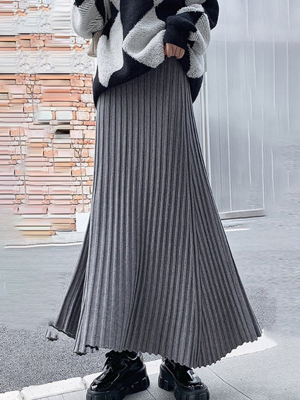 Jupe plissée coupe trapèze, taille haute, couleur unie