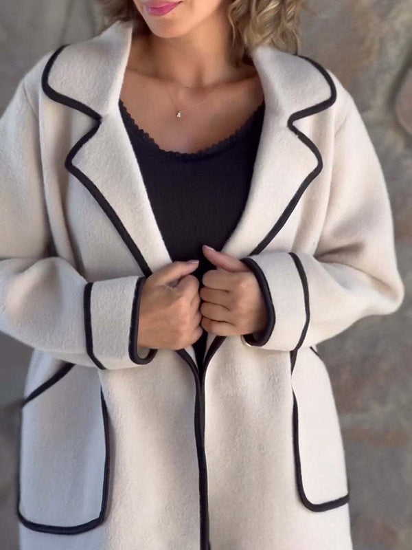 Manteau en laine ample boutonné à manches longues, à poches, à empiècements, à col cranté