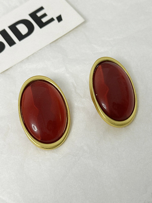 Boucles d'oreilles géométriques à empiècements