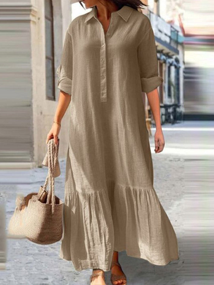Robe longue boutonnée plissée coupe trapèze, à manches longues, à empiècements, à col revers, couleur unie