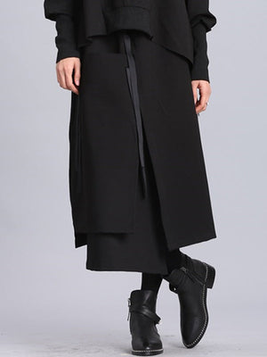 Jupe Empire noire asymétrique à bandes surélevées