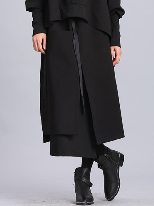 Jupe Empire noire asymétrique à bandes surélevées