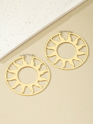 Boucle d'oreille soleil creuse de couleur unie