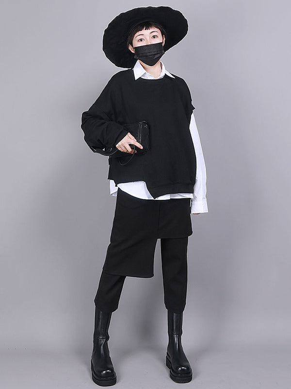 Jupe-culotte noire asymétrique taille empire, effet deux pièces