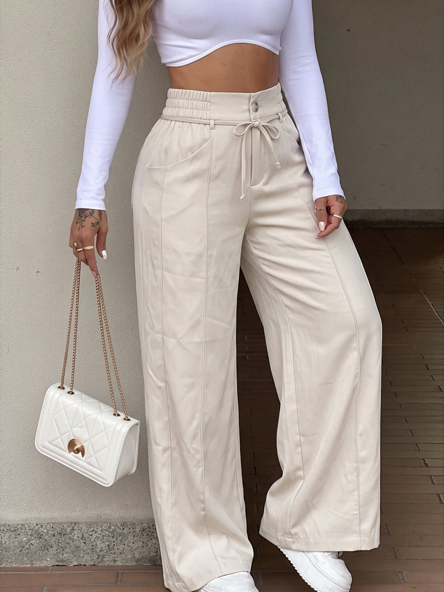 Pantalon ample à poches, à taille élastique, à jambes larges, couleur unie