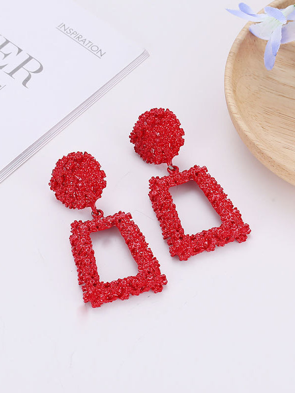 Boucles d'oreilles pendantes géométriques ajourées couleur unie