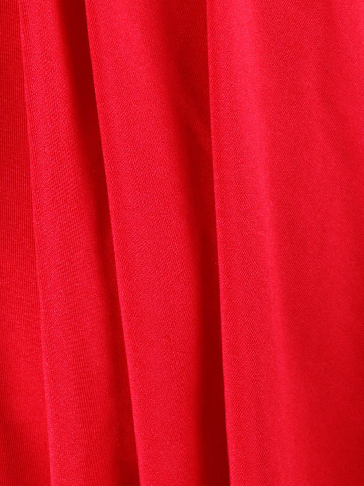 Robe courte plissée coupe trapèze, à taille élastique, dos nu, à empiècements, à décolleté en V profond, couleur unie